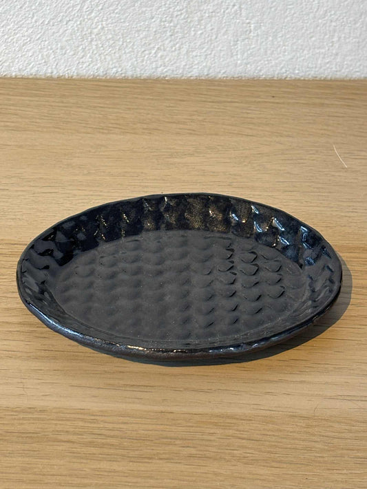 Liten skål med drage mønster